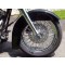 Our fender lowering kit installed in a clean fender, shown with a 18" wheel. 