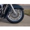 Our fender lowering kit installed in a clean fender, shown with a 18" wheel. 
